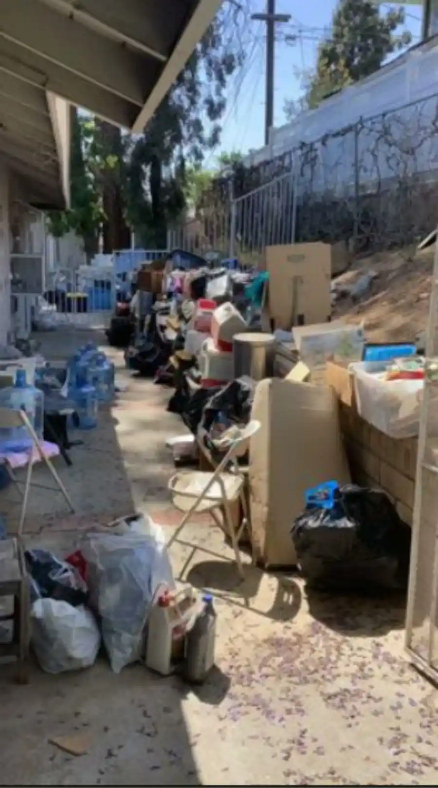 Yard waste and debris piled up for removal in Hemet, CA