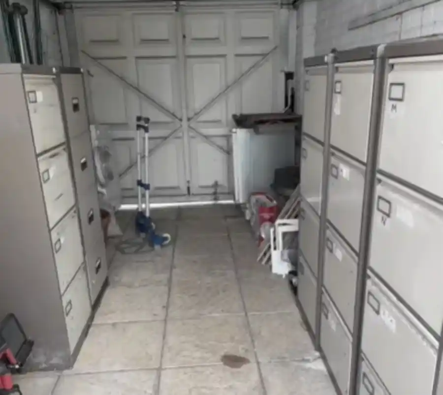 Office cleanout crew clearing furniture and equipment from a Hemet business